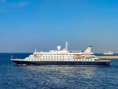 Rhodes, Greece - May 2022: Sea Dream II luxury cruise ship leaving the island's port