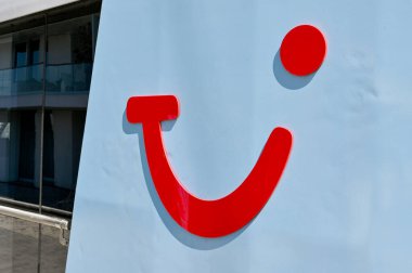 Antwerp, Belgium - August 2022: Close up view of the TUI logo on the side of a river cruise ship