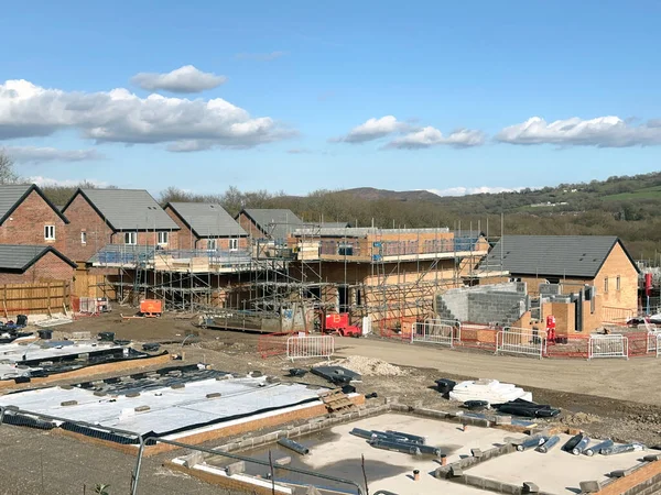 stock image Pontypridd, Wales - April 2023: House foundations and unfinished detached houses on a new housng development in Church Village near Pontypridd