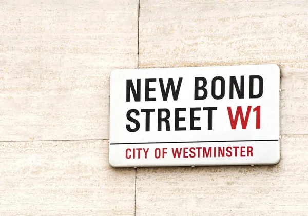 stock image London, England, UK - 28 June 2023:  Sign on a wall at the start of New Bond Street, which is London's main shopping centre for luxury and designer goods.
