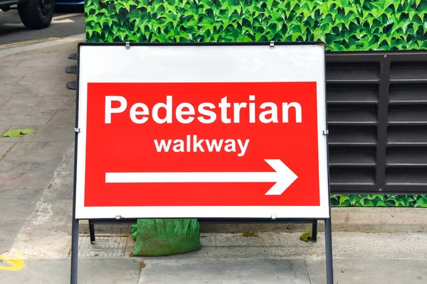 Road Sign Showing Pedestrians Alternative Walway Road Works People — Stock Photo, Image