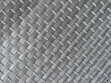 Örgü, bahçe mobilyalarının örülmesiyle oluşmuş. İnsan yok. Arkaplan.