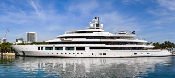 Miami, Florida, USA - 5 December 2023: Panoramic view of luxury super yacht Infinity moored in the harbour on the Miami waterfront. The ship is owned by Eric Smidt and was built by Oceanco in The Netherlands.