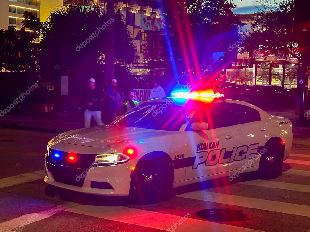 Miami, Florida, USA - 2 December 2023: Police patrol cruiser 4x4 vehicle with flashing lights operated by the Hialeah police department in Miami at night