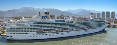 Puerto Vallarta, Mexico - 15 January 2024: panoramic view of the cruise ship Island Princess docked in the port of Puerto Vallarta.. Operated by the Princess Cruise Line, it is owned by the Carnival Corporation. clipart