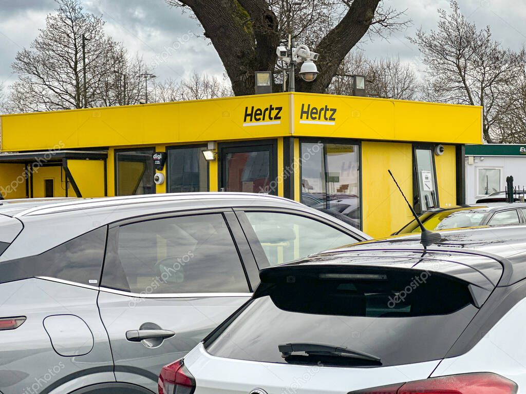 Birmingham, England, UK - 16 March 2024: Rental cars parked outside the branch of Hertz at Birmingham Internaltional Airport