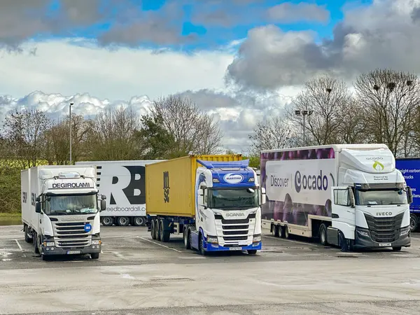 stock image Strensham, Worcestershire, UK - 17 March 2024: Row of articulated lorries parked at the Strensham M5 motorway service station