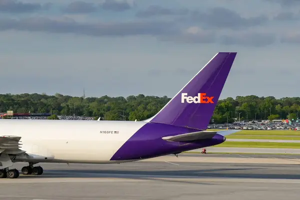 stock image Baltimore, Maryland, USA - 3 May 2024: Tail fin of Boeing 767 cargo jet (registration N168FE) operated by Federal Express FedEx