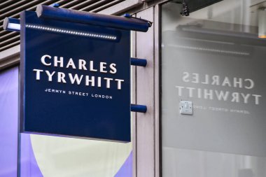 London, England, UK - 27 June 2023: Sign above the entrance to a branch of the Charles Tyrwhitt eman's clothing store clipart