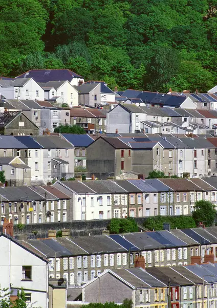 stock image Rhondda Valley, Wales, UK - August 1992: Rows of traditional terraced housing 