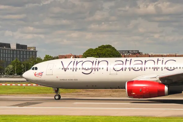 stock image London, England, UK - 28 April 2024: Airbus A330 (registration G-VKSS) operated by Virgin Atlantic Airways preparaing to take off from London Heathrow airport.