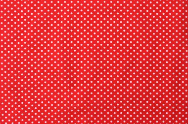 Beyaz polkadot desenli parlak kırmızı kumaş. Arkaplan.