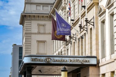 London, England, UK - 24 August 2023: Entrance to the Hilton London Paddington hotel clipart