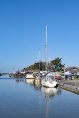 Bude, Cornwall, England, UK - 22 February 2025: Scenic view of boats on the Bude Canal. clipart