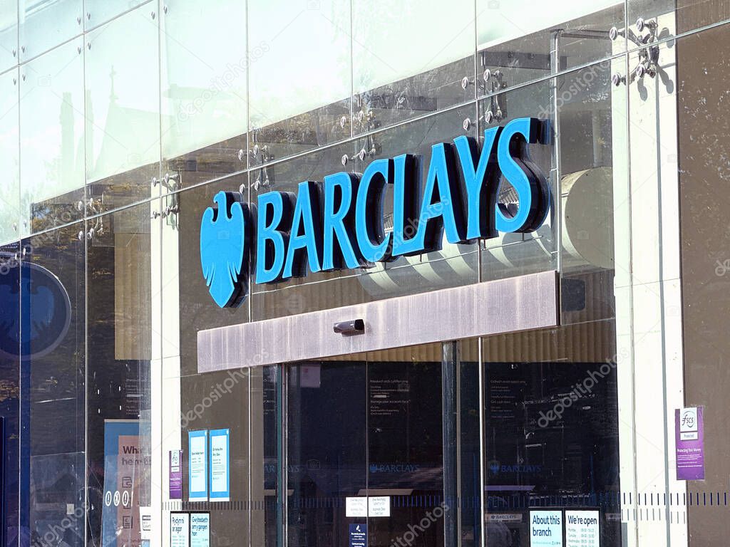 Cardiff, Wales, UK - 9 May 2025: Sign above the entrance to the branch of Barclays Bank in Cardiff city centre