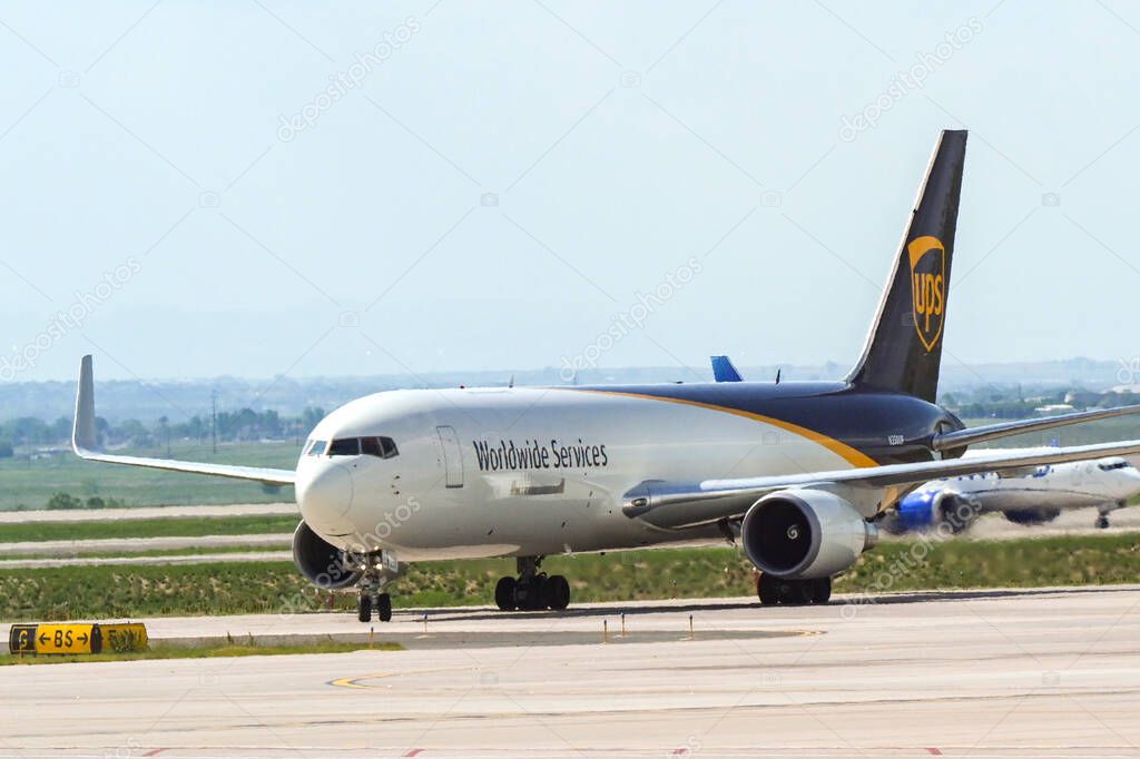 Denver, Colorado, USA - 5 June 2025: Boeing 767 cargo jet (registration N350UP) operated by United Parcel Service UPS taxiing after landing at Denver International Airport.