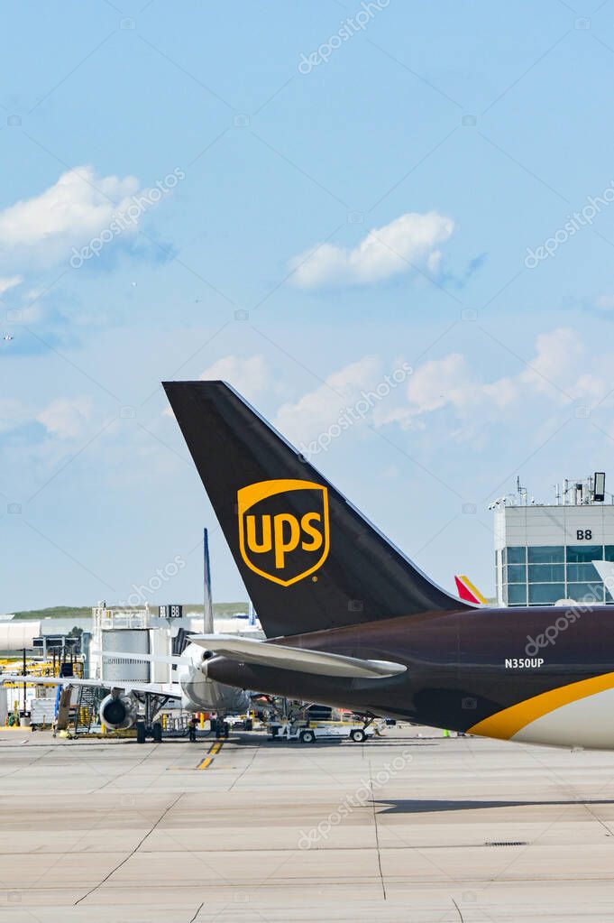 Denver, Colorado, USA - 5 June 2025: Tail fin of a Boeing 767 cargo jet (registration N350UP) operated by United Parcel Service UPS taxiing after landing at Denver International Airport.