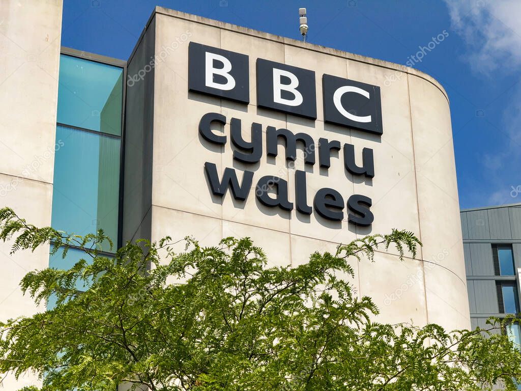 Cardiff, Wales, UK - 18 June 2025: Sign on the outside of the BBC Cymru Wales television and radio studios in the city centre