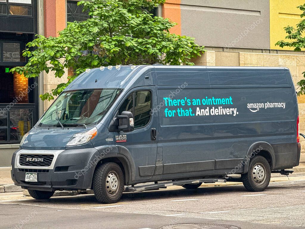 Denver, Colorado, USA - 2 June 2025: Delivery van used by the Amazon Pharmacy stopped in the city centre.