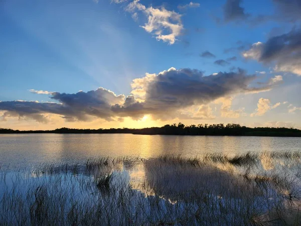 stock image Colorful sunrise coudscape over Nine Mile Pond in Everglades National Park, Florida on sunny autumn morning.