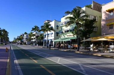 Miami Beach, Florida - January 7, 2023 - Art deco hotels on Ocean Drive in South Beach on clear cloudless sunny morning..