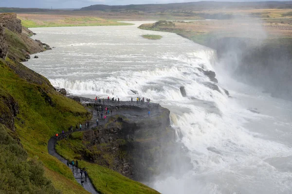 Gullfoss - Golden Falls - on Icelands Golden Circle route near Reykjavik under autumn cloudscape.