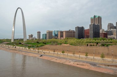 Saint Louis, Missouri - April 9. 2024 - View of Gateway Arch National Park and St Louis skyline from Eads Bridge over Mississippi River. clipart