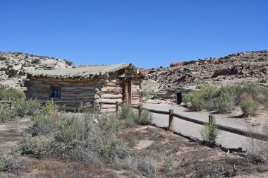 Wolfe Ranch or Turnbow Cabin in Arches National Park on clear sunny summer morning. clipart