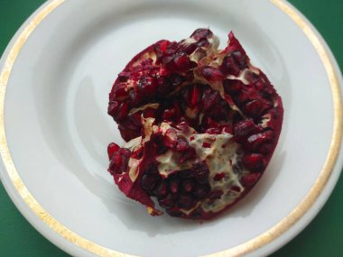 Red ripe pomegranate a the seeds