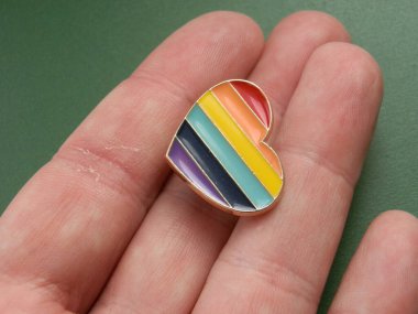 Religious metal symbol medallion in the hand