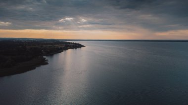 Aerial view of lake with facilities and boats
