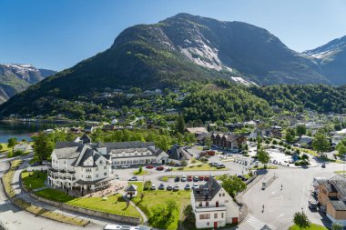 The charming little town of Eidfjord on the fjord of the same name in Norway clipart