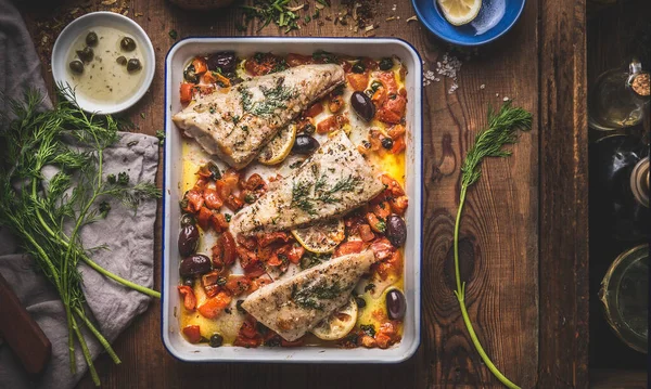 Tasty Bass Fish Fillets Mediterranean Sauce Tomatoes Olives Capers Baking — Stock Photo, Image