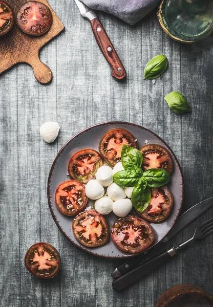 Tomatoes Mozzarella Balls Salad Basil Leaves Rustic Table Ingredients Top — Stock Photo, Image