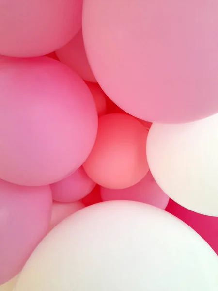 Air balloons. Pink and white balloons background