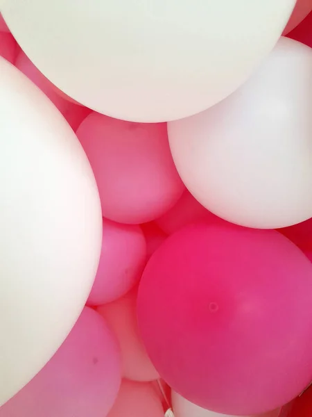 Air balloons. Pink and white balloons background