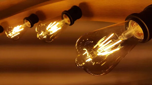 Decorative energy saving lamp. Decorative light bulb. Vintage lighting