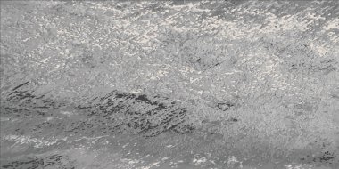 Gri bir arka plan var. Şekilsiz gri noktaların arka planı. Vektör illüstrasyonu