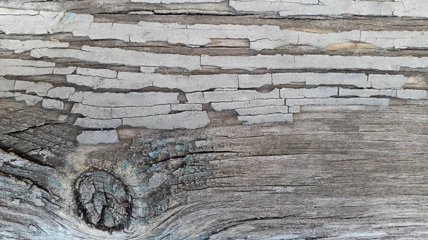Old wood. Aged wood with peeling old paint