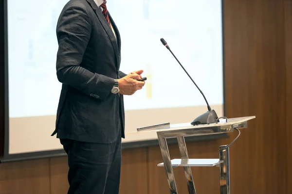 Speaker at business conference or corporate presentation