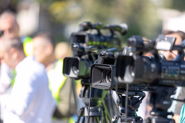Covering an media event with a video camera