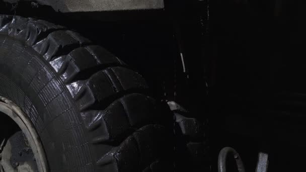 Tyre Big Industrial Truck Wheel Water Drops Steam Night Dark — Video