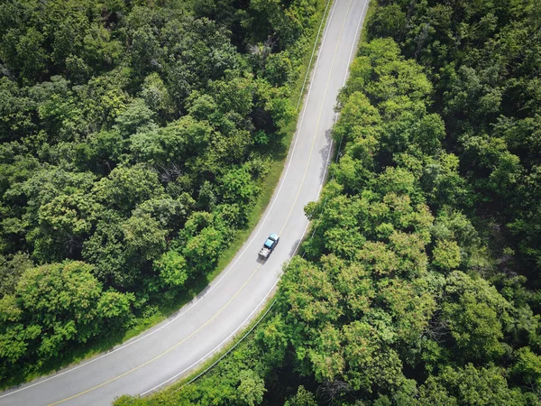 curve road top - Aerial top view rural road in the forest, road and rain forest, Aerial view road in nature, Ecosystem and healthy environment