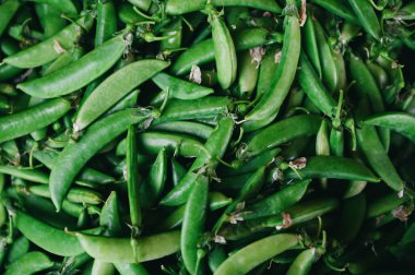 snow pea - Green pea texture background top view, pisum peas