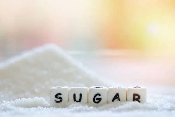 Sugar on nature blur background, white sugar for food and sweets dessert candy heap of sweet sugar crystalline granulated