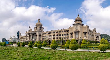 Largest legislative building in India - Vidhan Soudha , Bangalore with nice blue sky background. clipart