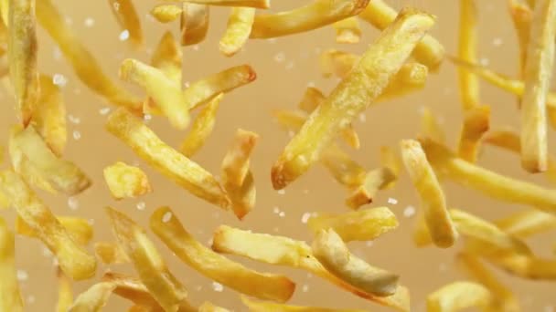 Super Slow Motion Shot French Fries Grain Salt Flying Camera — Stock video