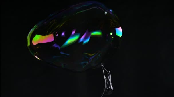 Super Slow Motion Shot Flying Cracking Colorful Soap Bubble Isolated — стокове відео