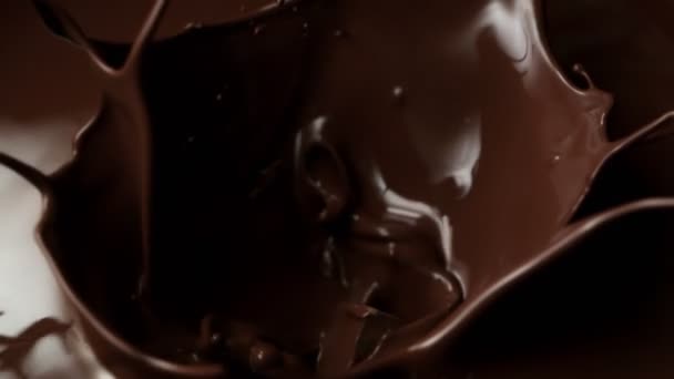 Super Slow Motion Shot Raw Chocolate Chunks Falling Melted Chocolate — Stock video