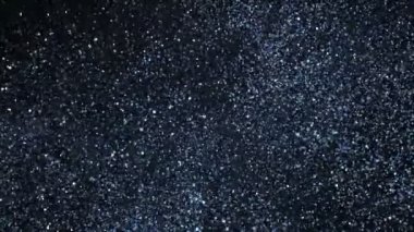 Renkli Parıldayan Arkaplan Süper Yavaş Çekimde, 1000fps 'de. 4K Çözünürlükte Yüksek Hız Sinema Kamerası ile Çekildi.